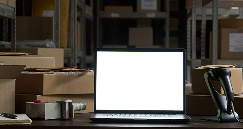 computer and boxes aid with fulfillment