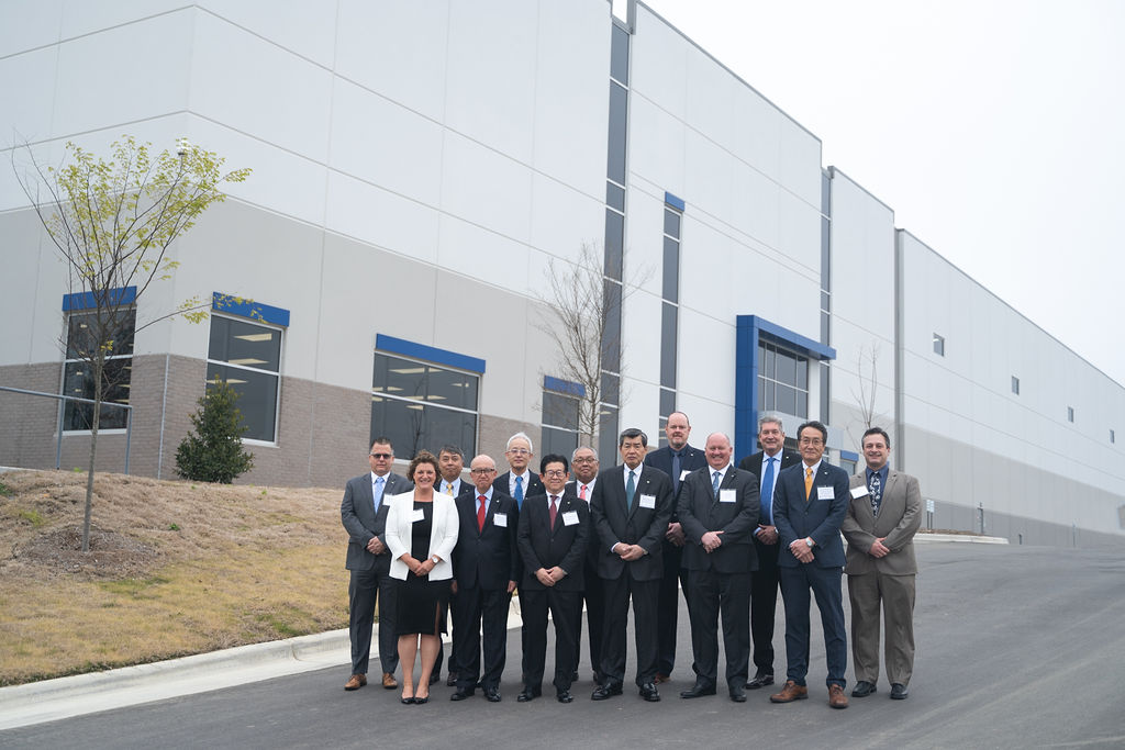 MD Logistics and Nippon Express Executives in front of Garner Warehouse